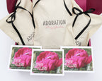 Product box featuring images of three peony blooms and three cotton bags.